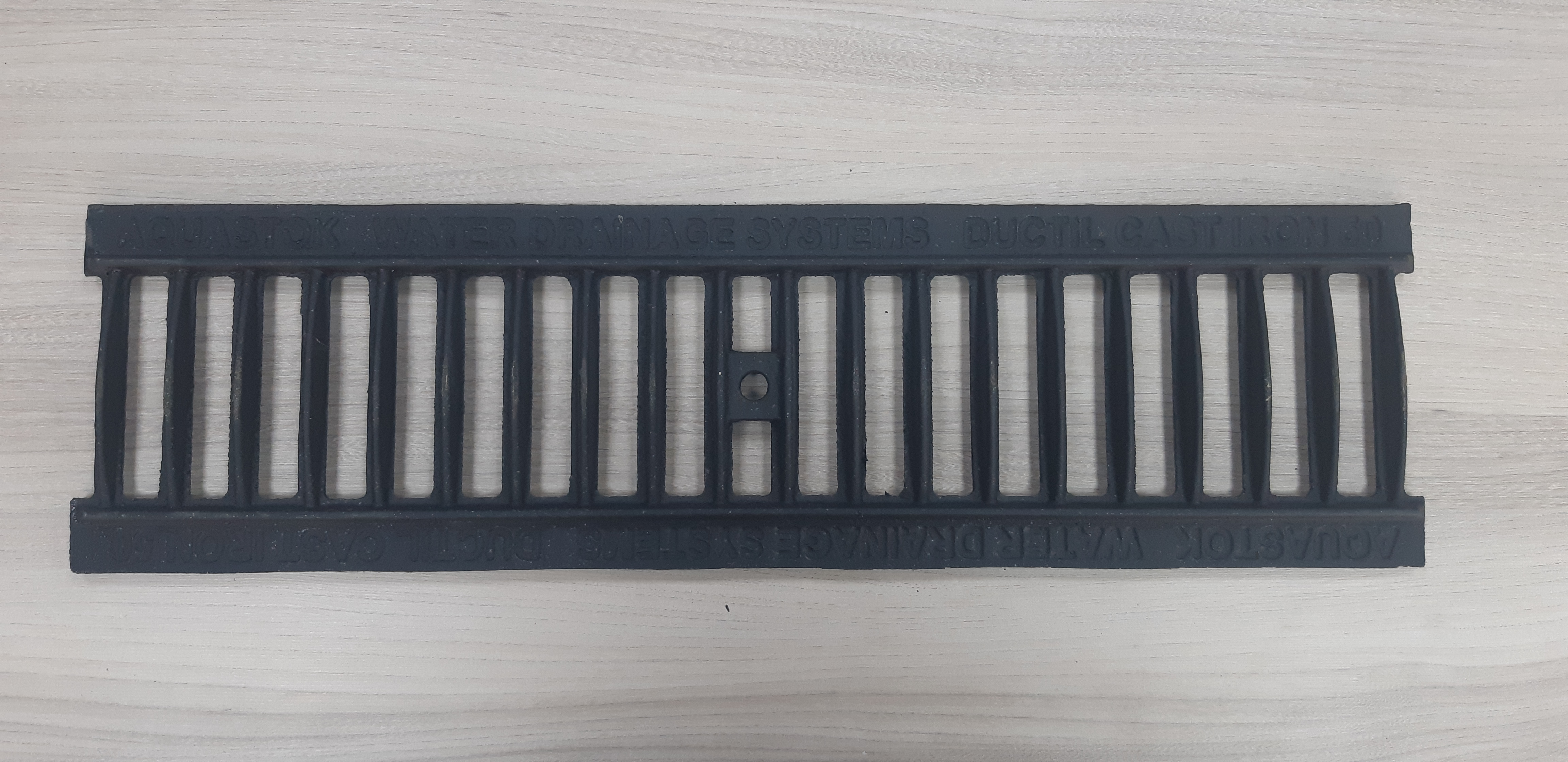 Решетка чугунная щелевая Norma DN100 B125 (500х136х15)