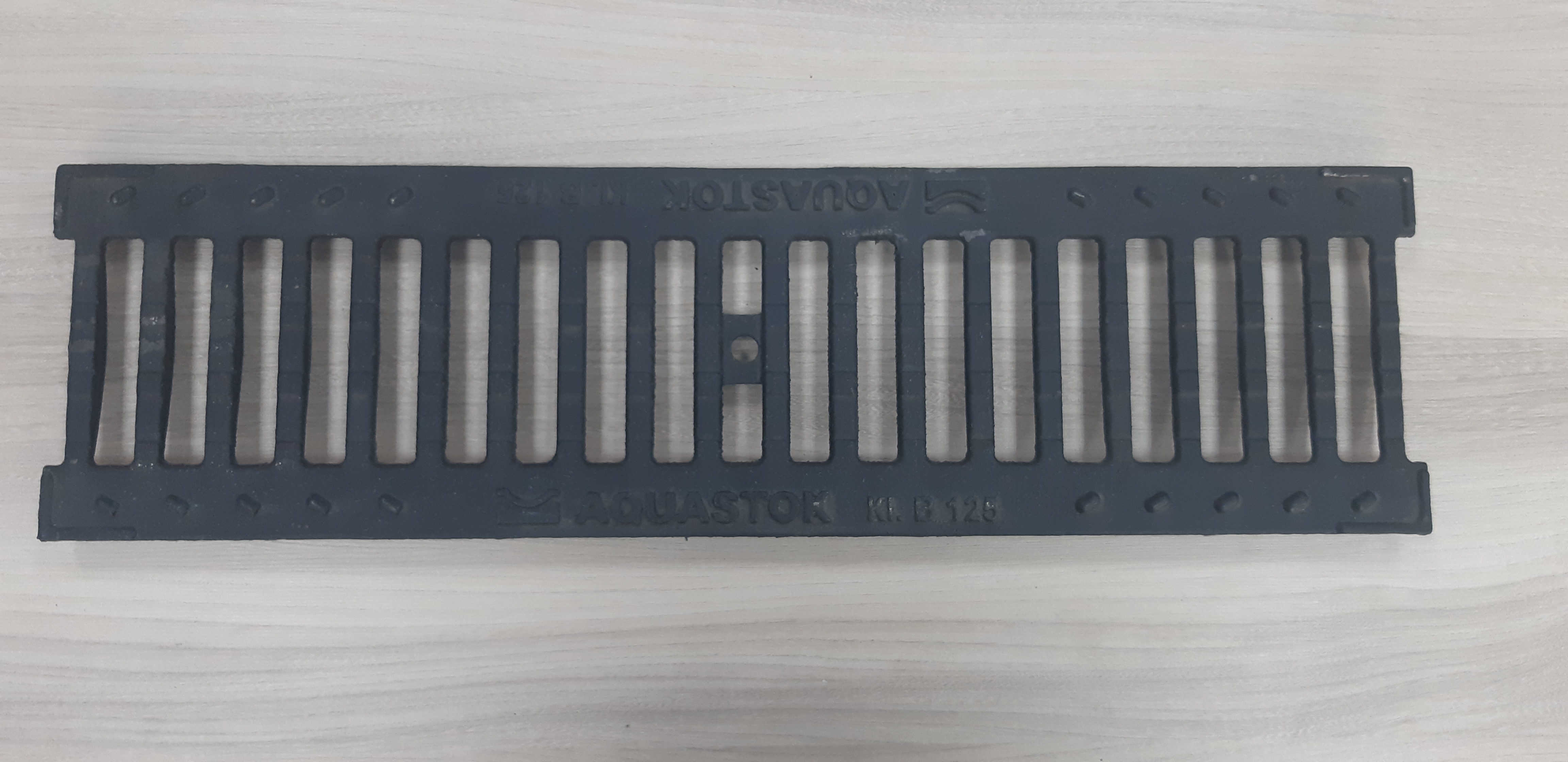Решетка чугунная щелевая Norma DN100 B125 (500х136х15)